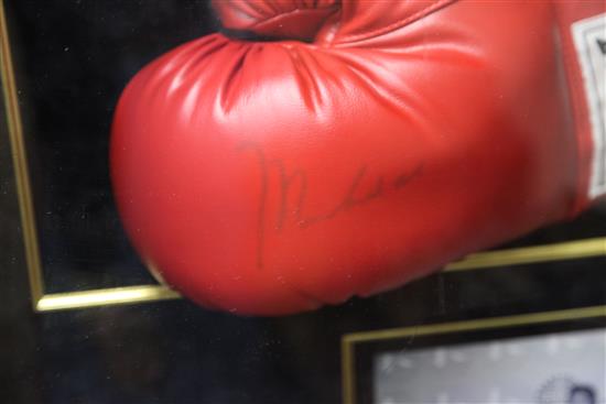 Muhammed Ali. A signed Everlast boxing glove, overall 2ft 9in. x 2ft 7in.